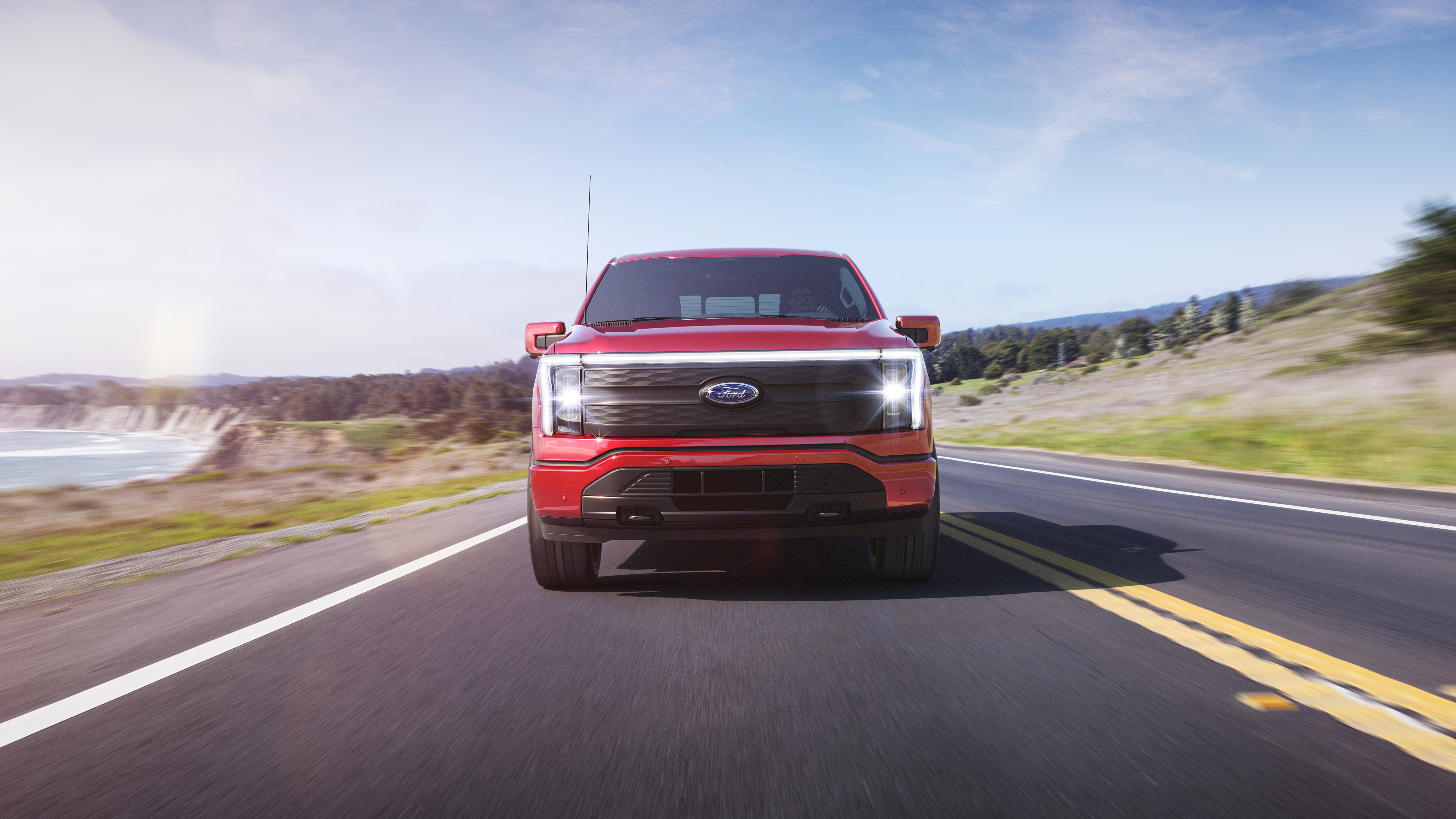 2022 Ford F-150 Lightning Lariat. Pre-production model with available features shown. Available starting spring 2022.