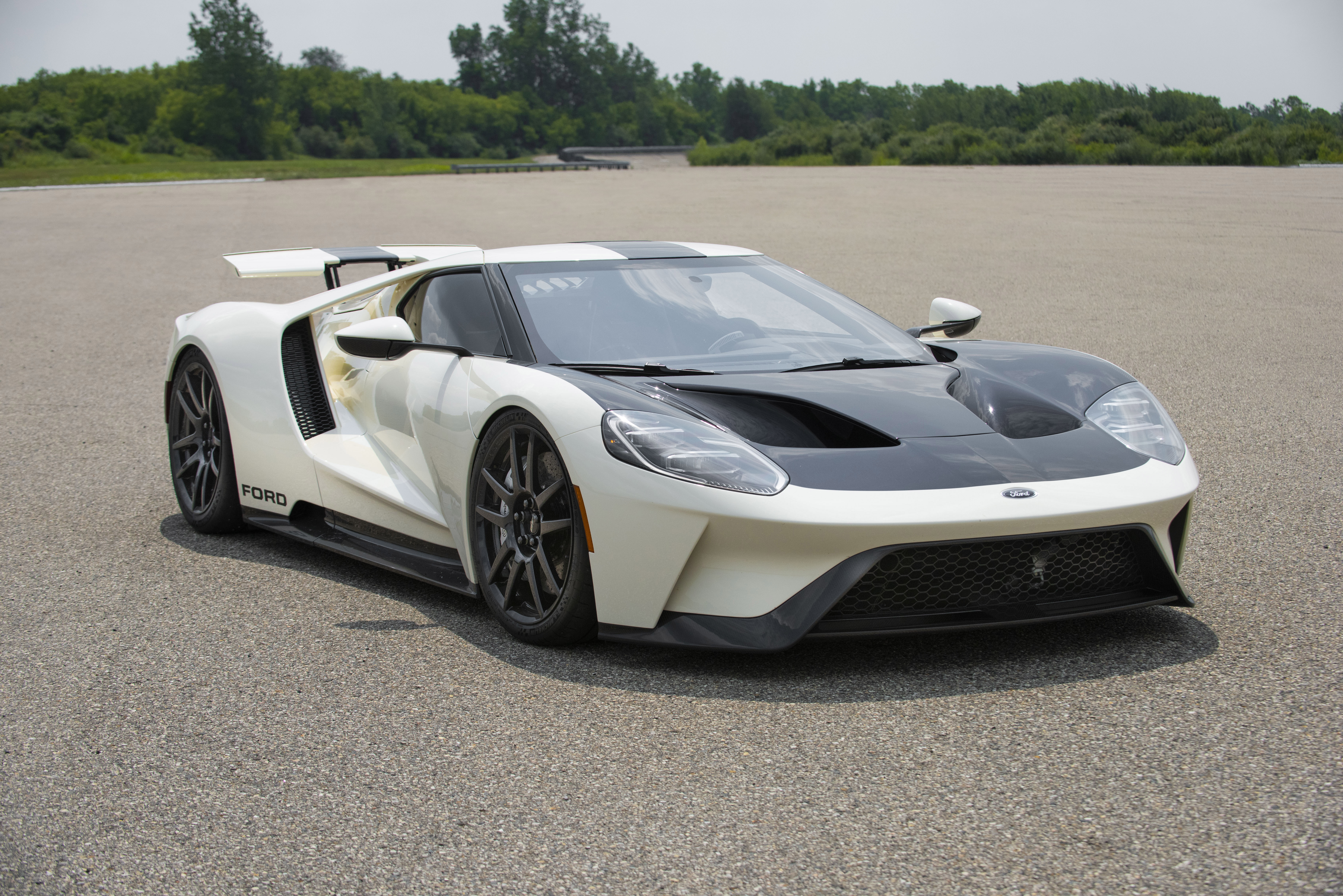 Preproduction 2022 Ford GT Heritage Edition shown.  Closed course.